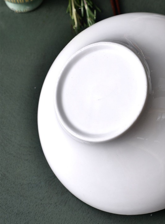 White Ceramic Wavy Bowls